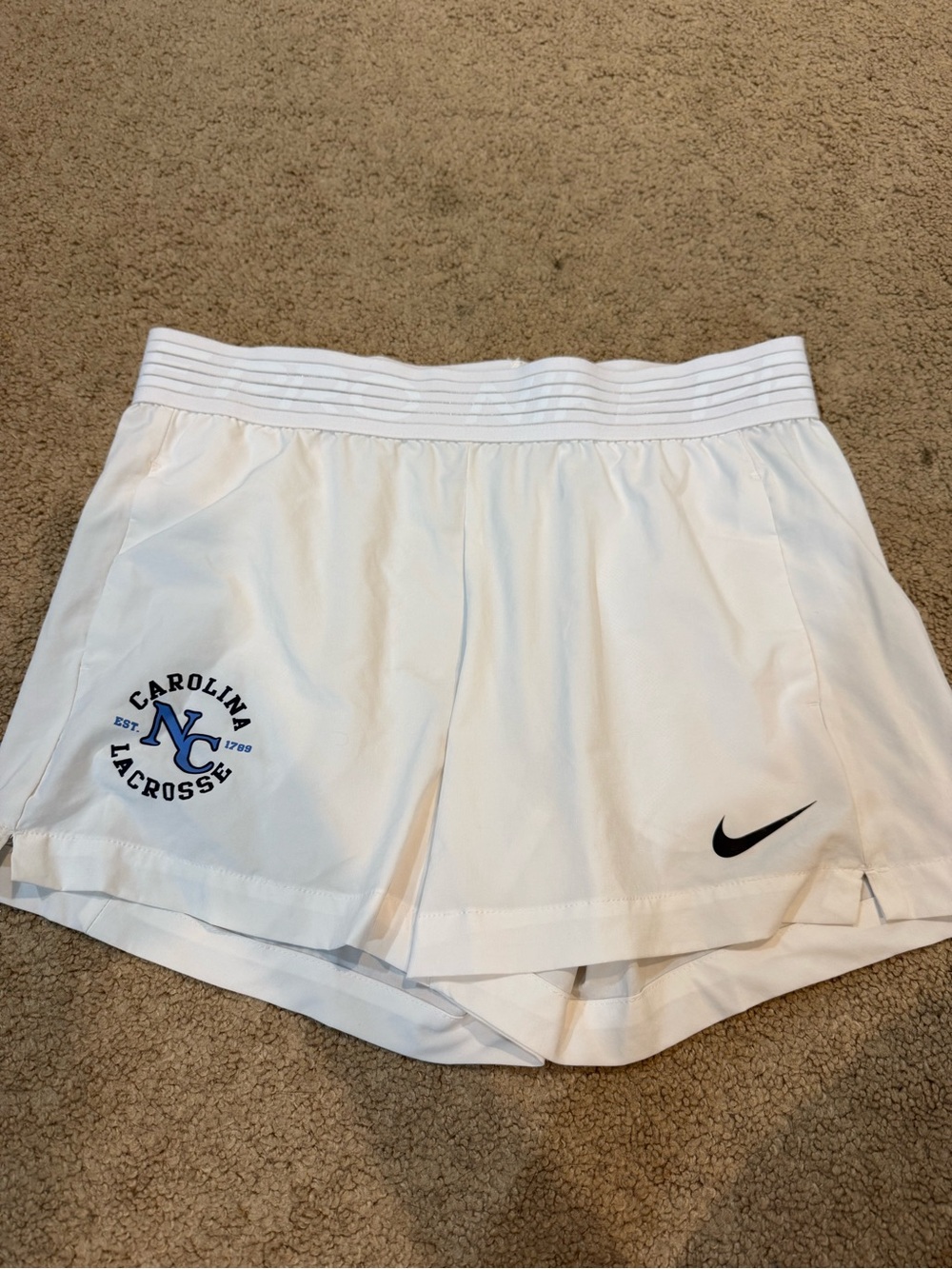 Nike White Women's Carolina Lacrosse Athletic Shorts with Blue Logo
